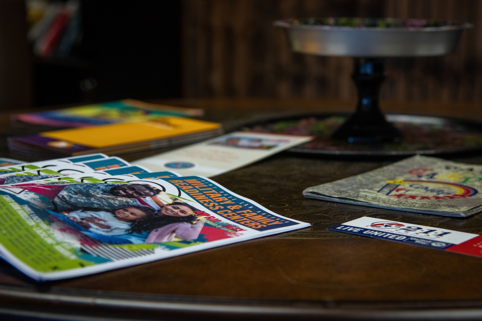 Pamphlets and brochures on a table.