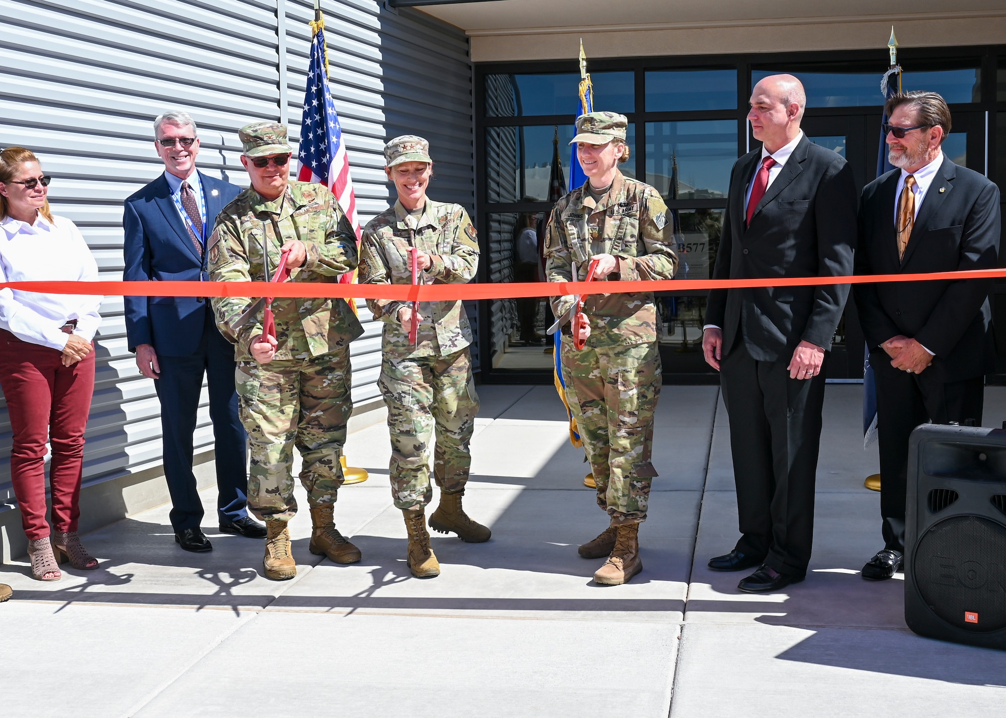 The Air Force Research Laboratory held a ribbon cutting ceremony celebrating the opening of the Space Warfighting Operations Research and Development laboratory May 20 at Kirtland AFB, N.M. Left to right: April Fitzner, U.S. Army Corps of Engineers; Mark Roverse, AFRL Spacecraft Technology Division chief; Col. Eric Felt, AFRL Space Vehicles director; Maj. Gen. Heather Pringle, AFRL commander; Maj. Katrina Johns, U.S. Army Corps of Engineers; Brian Engberg, AFRL Space Control Branch chief, and Bradley Rieck, AFRL senior facility engineer. (U.S. Air Force photo/Tech. Sgt. Jenna Bigham)