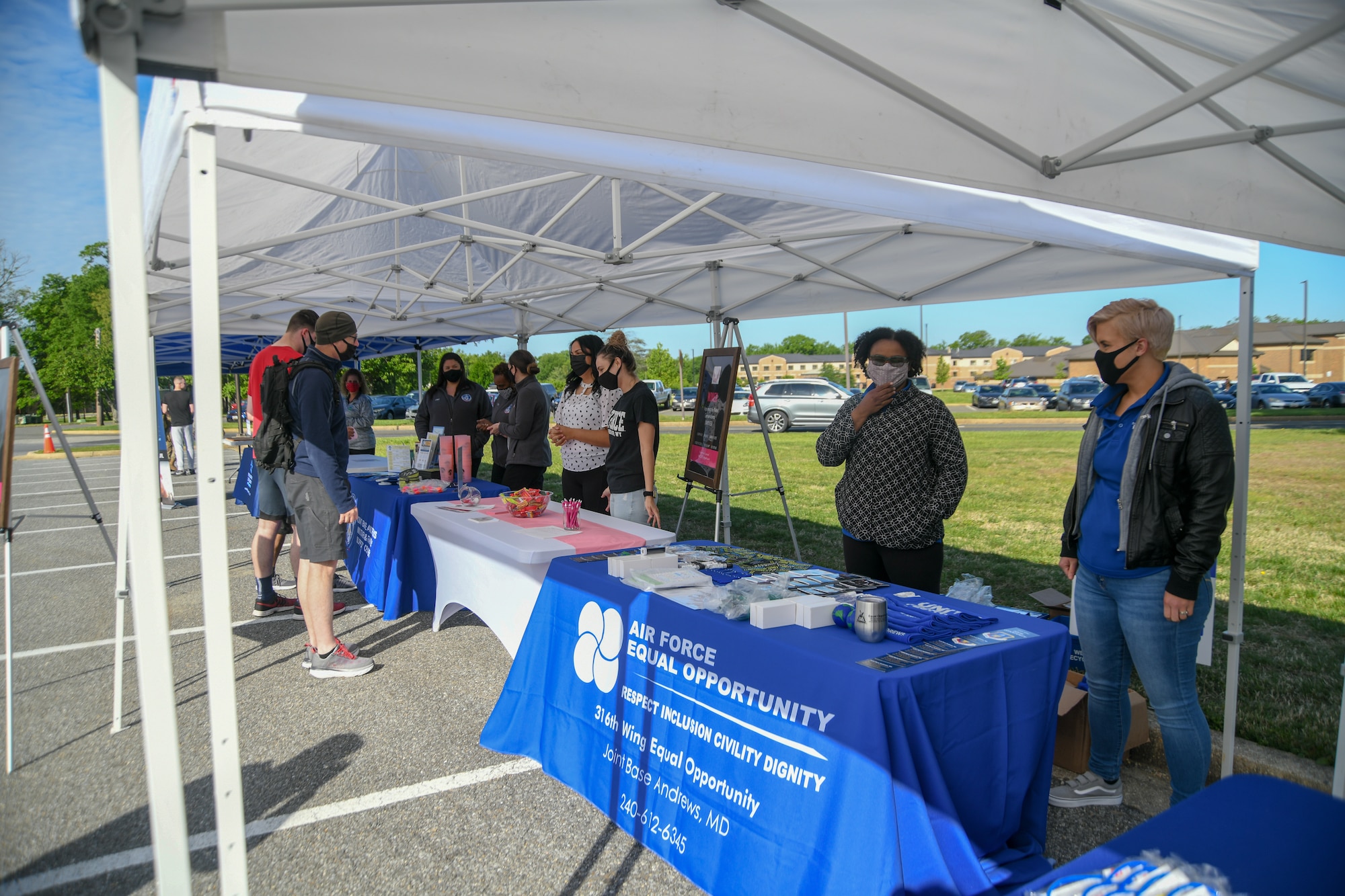 Several Joint Base Andrews organizations host a training and education event during Wingman/Shipmate Day to teach service members their purpose and importance at JBA, Md., May 11, 2021. Sexual Assault Prevention and Response, Military and Family Support Center, Women Inspiring the Next Generation, and Air Force Equal Opportunity handed out pamphlets and snacks to help increase awareness about their organizations. (U.S. Air Force photo by Airman 1st Class Bridgitte Taylor)