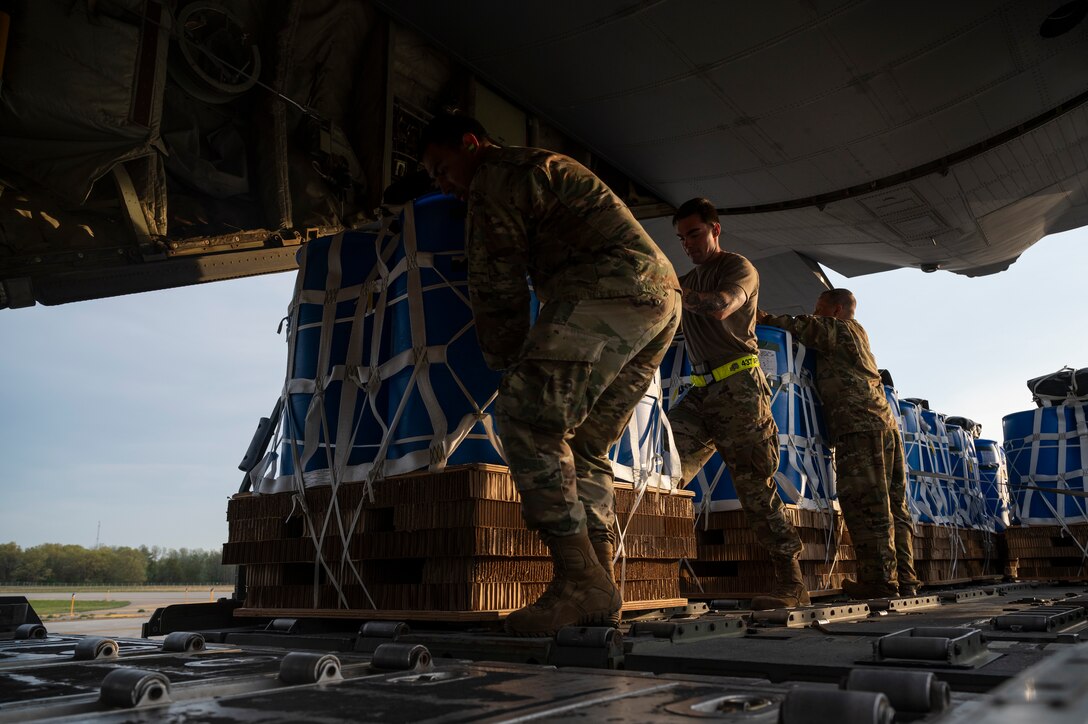 Airmen transfer a container delivery system