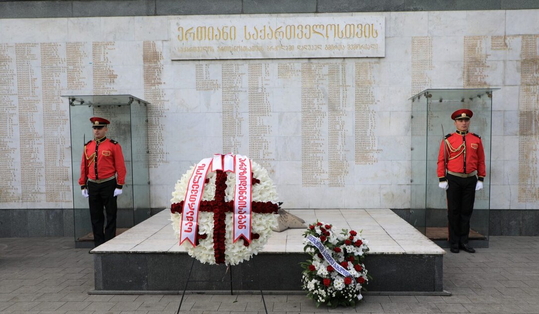 U.S. ambassador to Georgia Kelly C. Degnan and members of the Walter Reed Army Institute of Research's U.S. Army Medical Research Directorate-Georgia laids wreaths in Hero's Square to commemorate the fall of Sokhumi in Georgia 27 years ago.