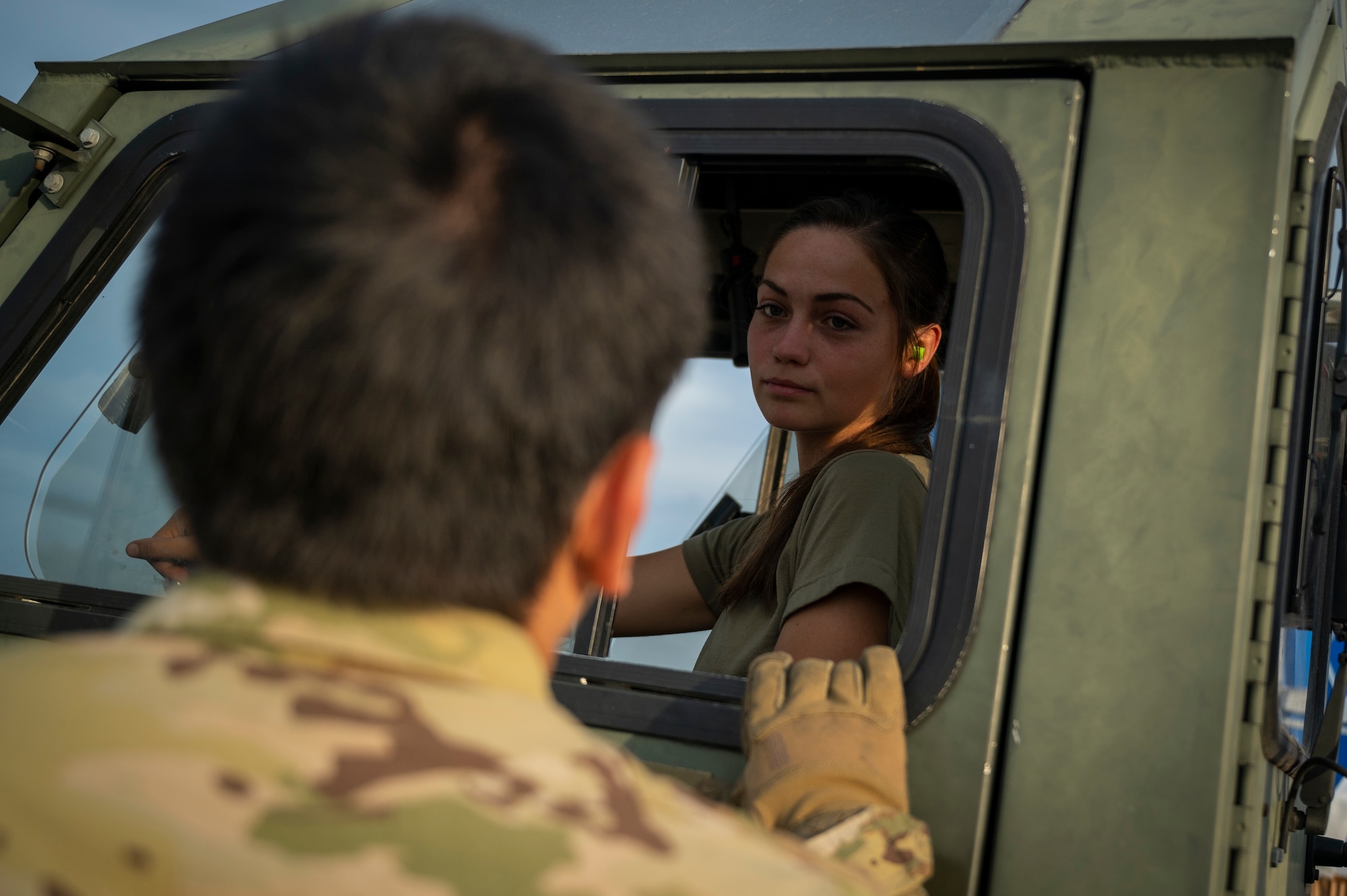 An Airman speaks to another Airman