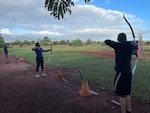 Army Recovery Care Program Soldiers take up ax throwing and archery