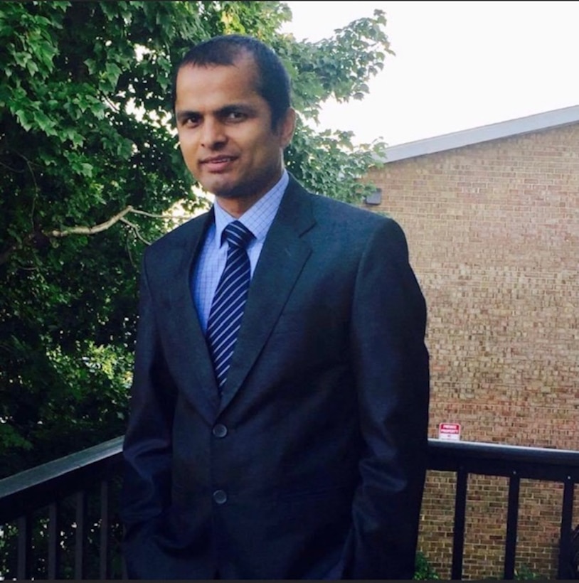 man posing on balcony