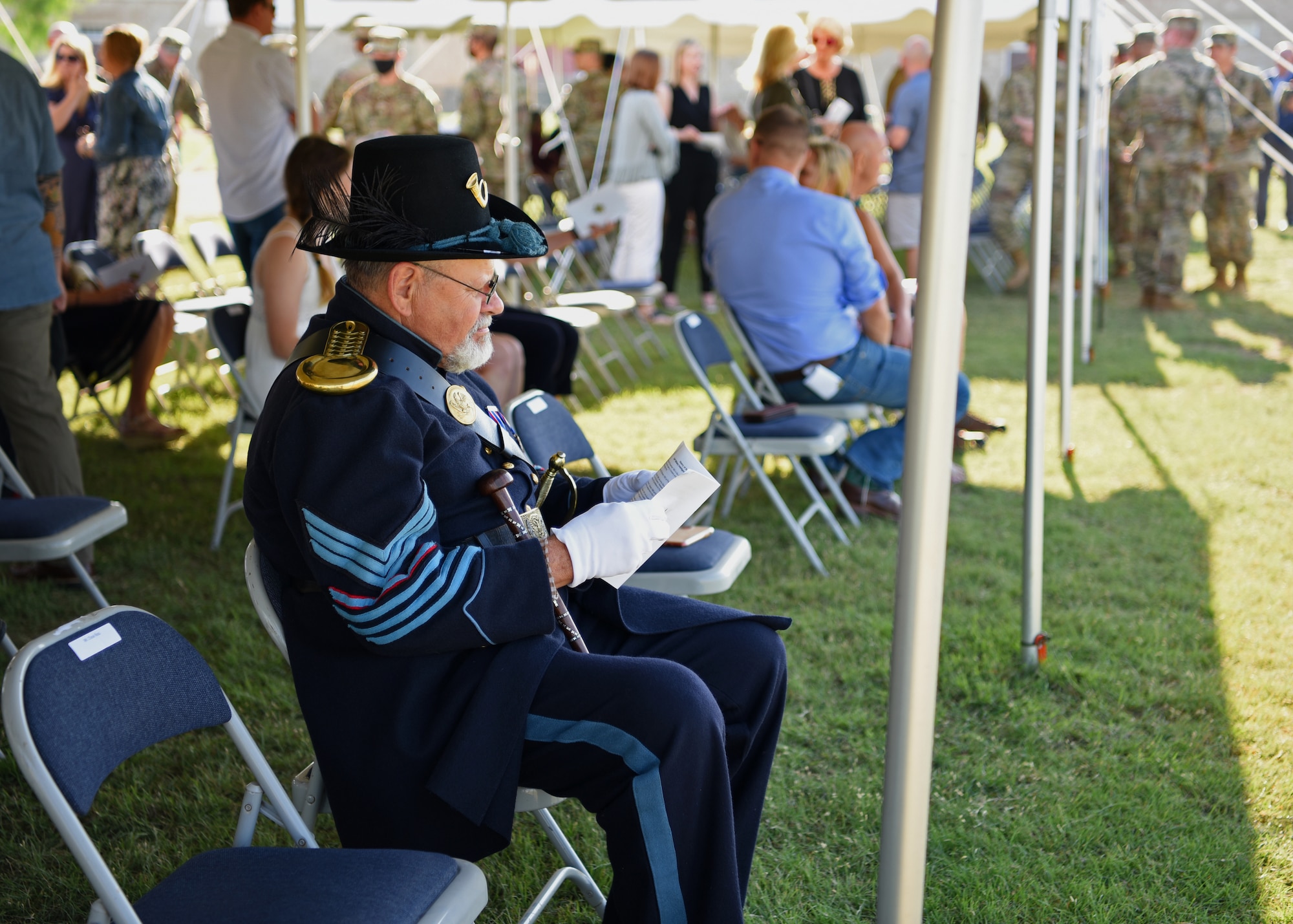 A member of The Fort Concho Foundation attends the U.S. Army 344th Military Intelligence Battalion Change of Command ceremony while wearing historically accurate Army attire, at Fort Concho, in San Angelo, Texas, May 21, 2021. The ceremony was held at Fort Concho, which was established in 1867, and is a National Historical Landmark. (U.S. Air Force photo by Senior Airman Abbey Rieves)