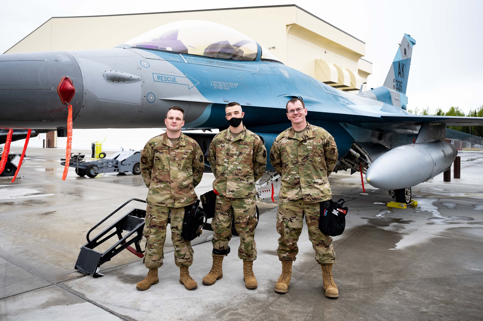 U.S. Airmen from the 18th Aircraft Maintenance Unit pose for a group photo on Eielson Air Force Base, Alaska, May 21, 2021.