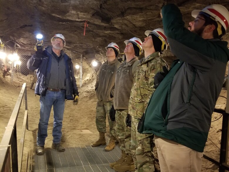 FAIRBANKS, Alaska (Feb. 6, 2019) - Cold Regions Research and Engineering Laboratory's Gary Larsen explains the significance of thermokarst cave ice to Brig. Gen. Vincent F. Malone, Col. Daryl Harger, 1st Lt. Evan Harkins and Jared Sapp  of the U.S. Army Combat Capabilities Development Command. The natural research facility helps to reveal how a sequence of climate shifts have affected the permafrost in central Alaska during and following the last Ice Age, enabling researchers to better predict future climate change effects on permafrost. search > CRREL permafrost ERDCinfo@usace.army.mil (U.S. Army photo by M. Kelly Rowland)