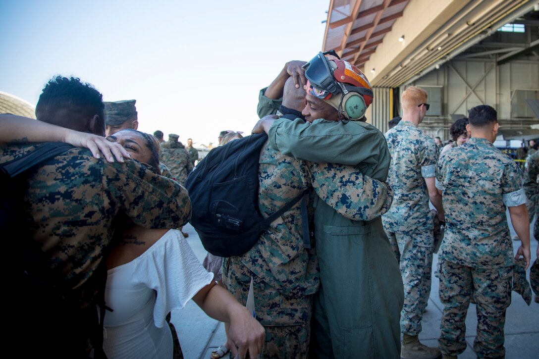 U.S. Marines with Marine Fighter Attack Squadron 122 reunites with loved ones after returning fromndeployment with the 15th Marine Expeditionary Unit (MEU) to Marine Corps Air Station Yuma, Arizona, May 18, 2021.