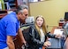 Kierstin Baldwin, a junior at Desert Junior-Senior High School on base, discusses her submission for the 2021 California Boys and Girls Clubs Military Youth of the Year competition with Paul La Bella, teen coordinator at Edwards AFB. Baldwin won the statewide competition and received a $2,500 scholarship recently. (Air Force photo by Gary Hatch)