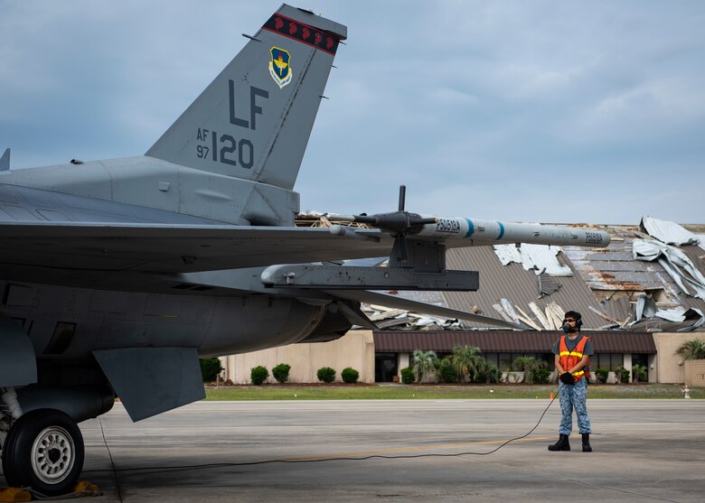A Republic of Singapore air force F-16 Fighting Falcon fighter aircraft tactical aircraft maintainer assigned to the 425th Fighter Squadron, Luke Air Force Base, Arizona, performs a launch inspection June 10, 2019, on the flightline at Tyndall Air Force Base, Florida. The 425th FS is at Tyndall to take part in a Combat Archer exercise. (U.S. Air Force photo by Airman 1st Class Bailee A. Darbasie)