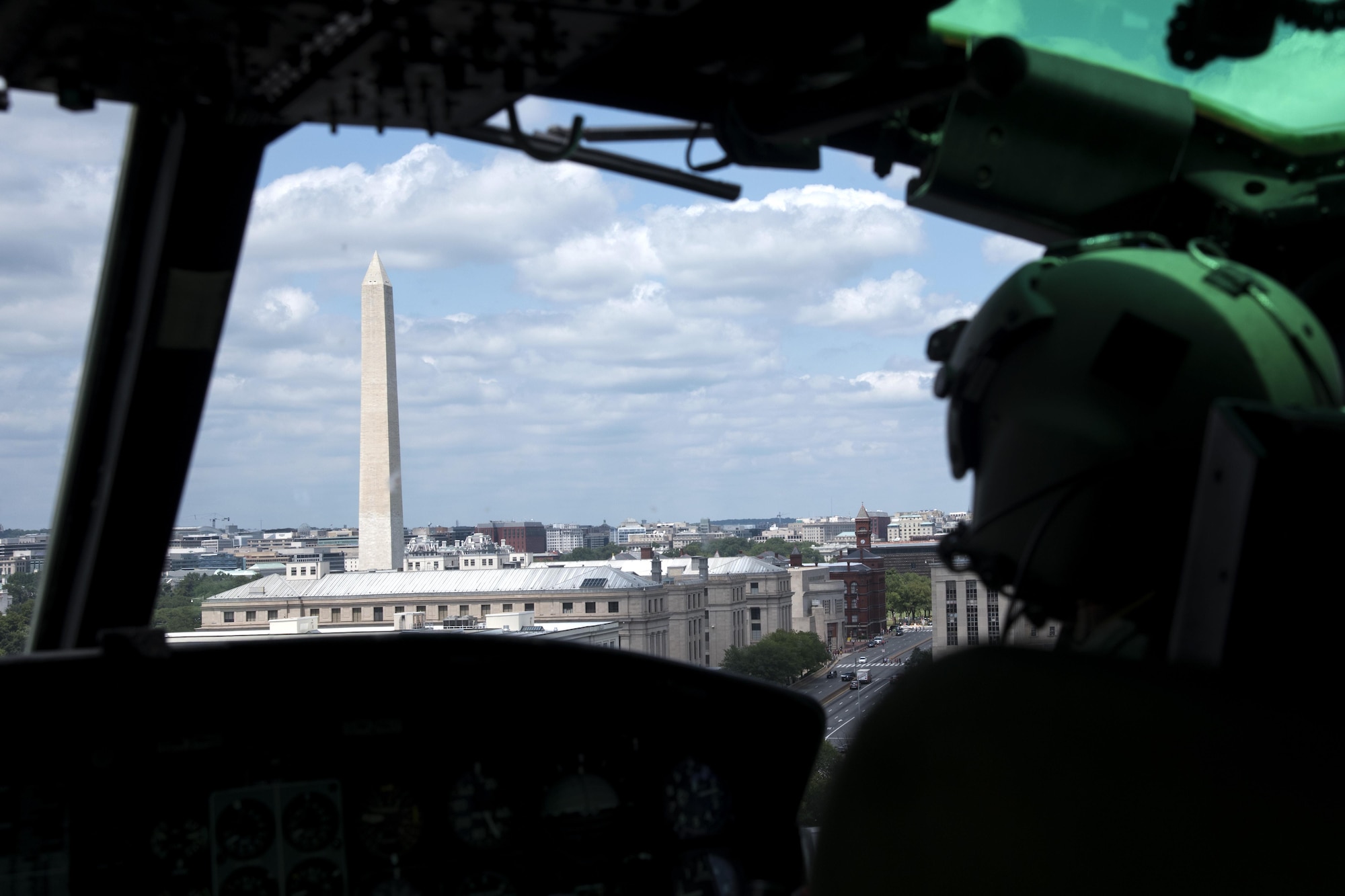 Capt. Brittny Barney, 1st Helicopter Squadron pilot, flies over Washington, D.C., in a UH-1N Huey helicopter Aug. 3, 2016. The 1st HS conducts high-priority airlift missions in the National Capitol Region and maintains the capability to provide defense support to civilian authorities in the event of a disaster. (U.S. Air Force photo by Airman 1st Class Philip Bryant)