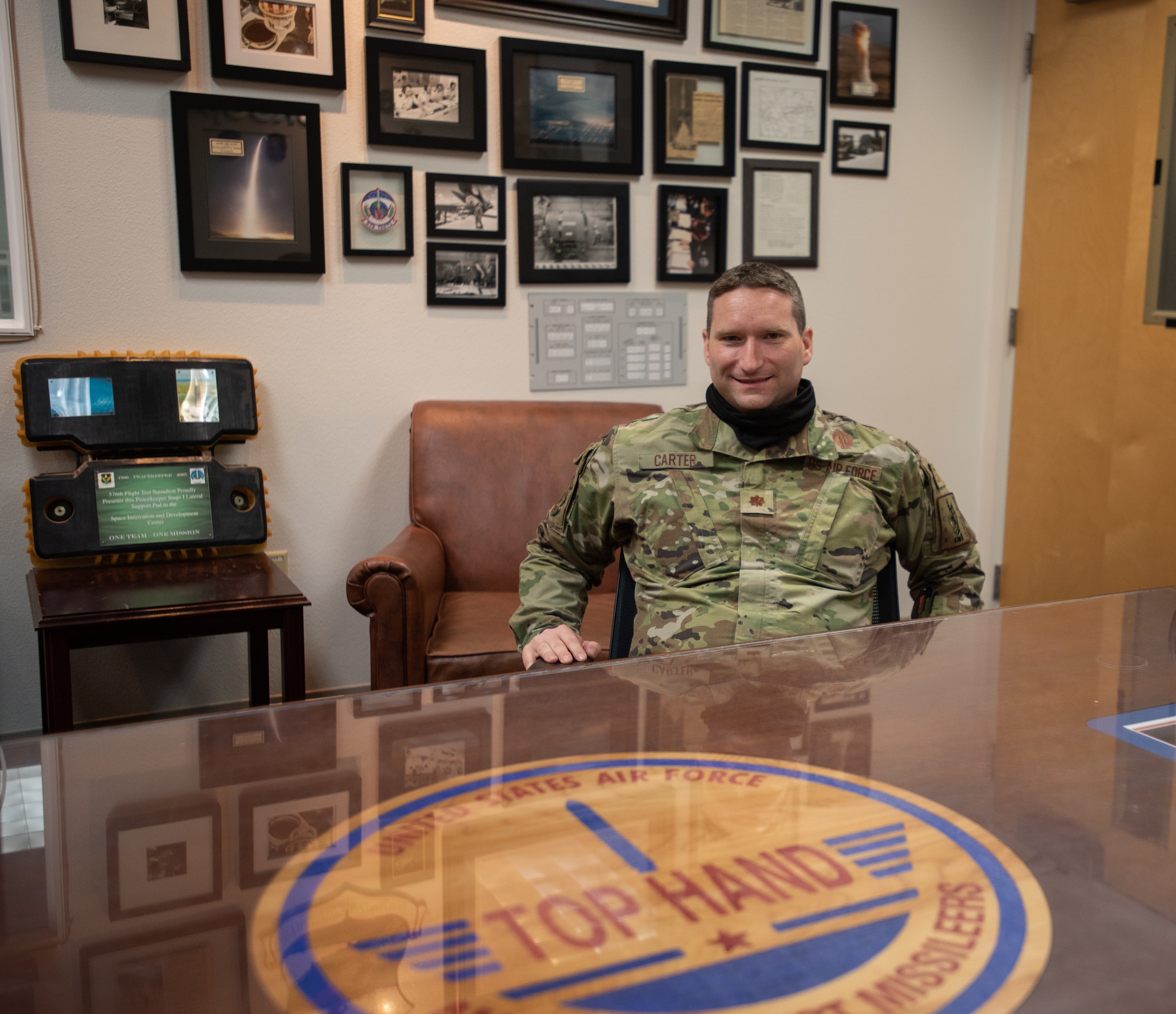 Airman poses for a photo in the ICBM heritage room.