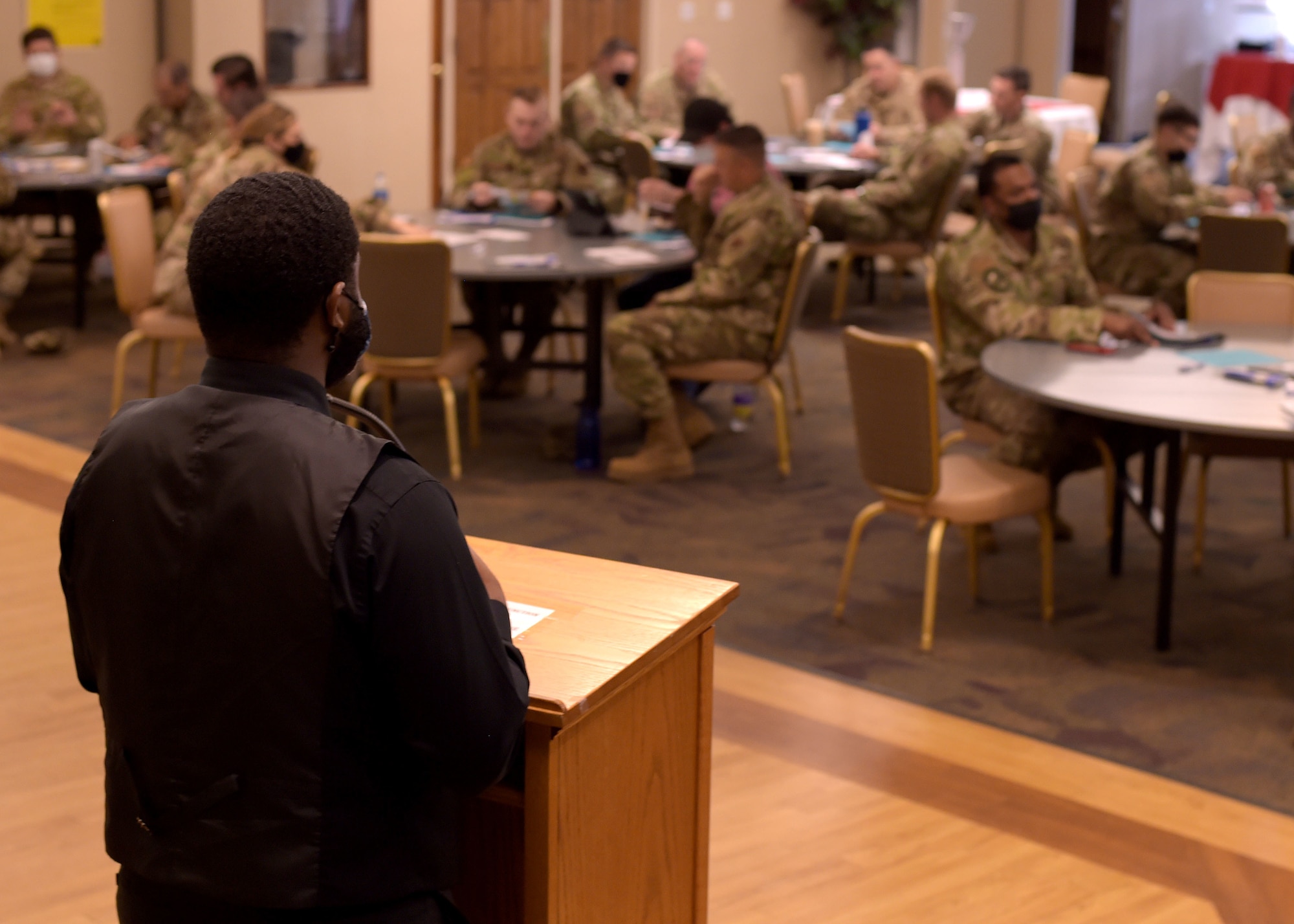 Airman delivers opening remarks at training event