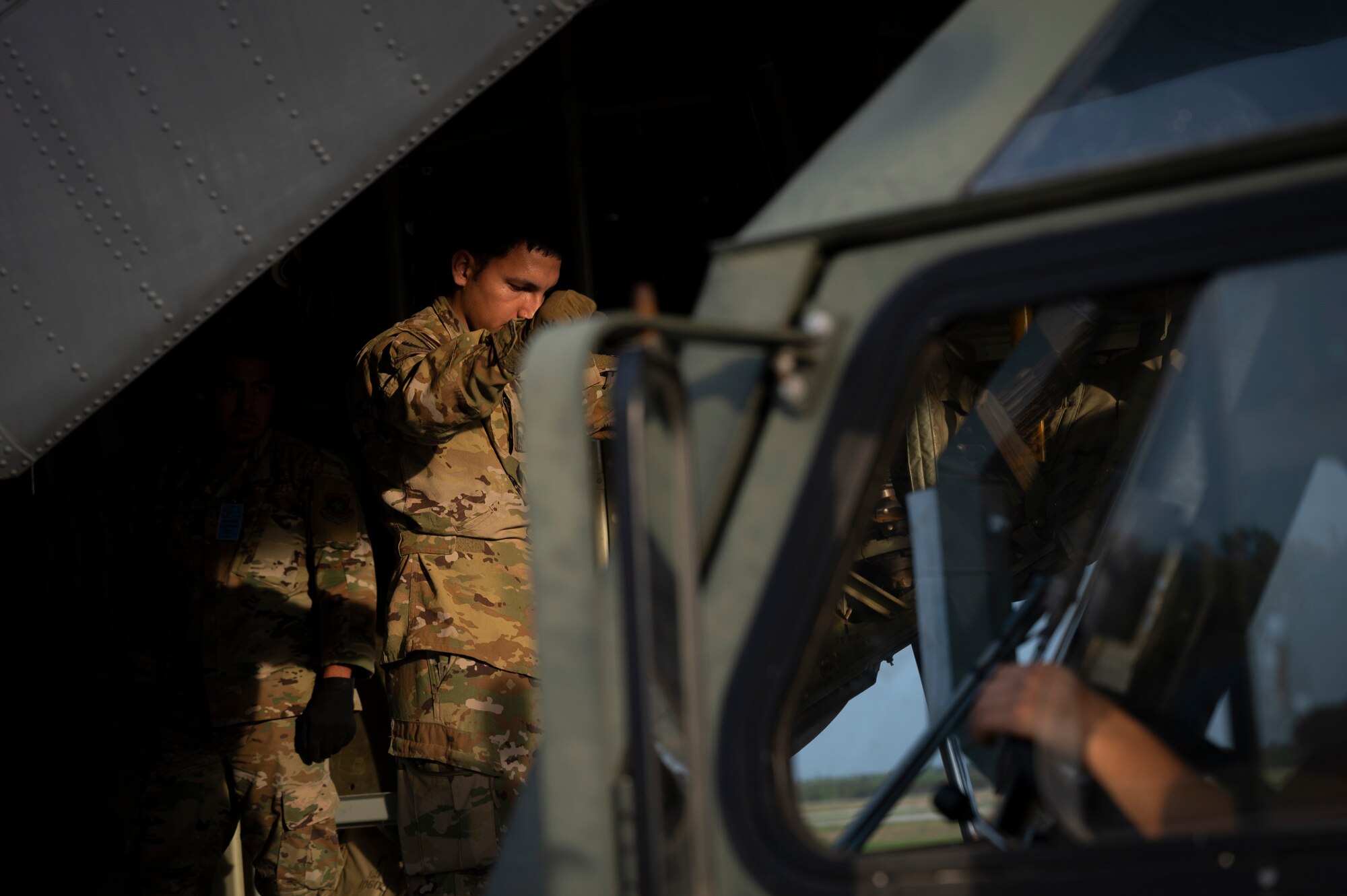 An Airman guides a K-loader