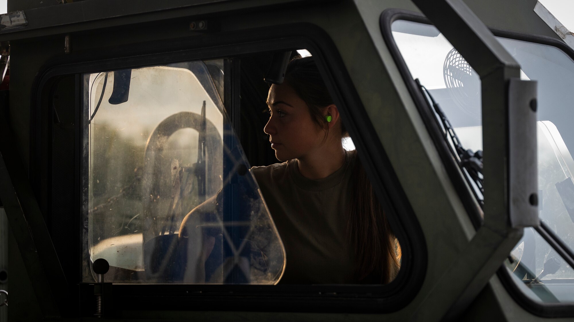 An Airman operates a K-loader