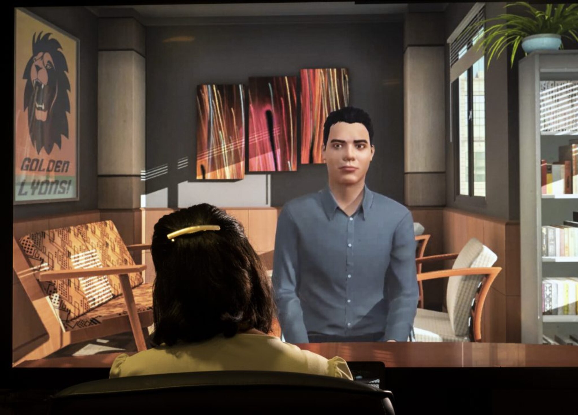 Janine Belasco, a U.S. Air Force simulation specialist, acts as a male avatar during a virtual empathy and interpersonal communication exercise, at Maxwell Air Force Base, Ala., The simulation was adopted as a capstone for Air University’s new Leadership Development Course. (U.S. Air Force photo by J.M. Eddins Jr.)
