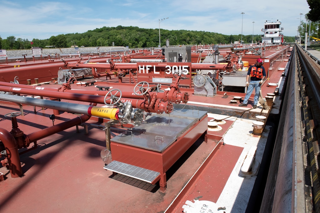 The Motor Vessel Tampa out of Ashland, Kentucky, moves Marathon Petroleum Company fuel barges May 21, 2021 through Cheatham Lock in Ashland City, Tennessee, headed to terminals in Nashville. The U.S. Army Corps of Engineers Nashville District worked with the fuel industry and Regional Rivers Repair Fleet, which is performing maintenance at the lock, to schedule openings to accommodate deliveries of fuel to Middle Tennessee. Each barge carries around 28,000 barrels of fuel. (USACE Photo by Lee Roberts)