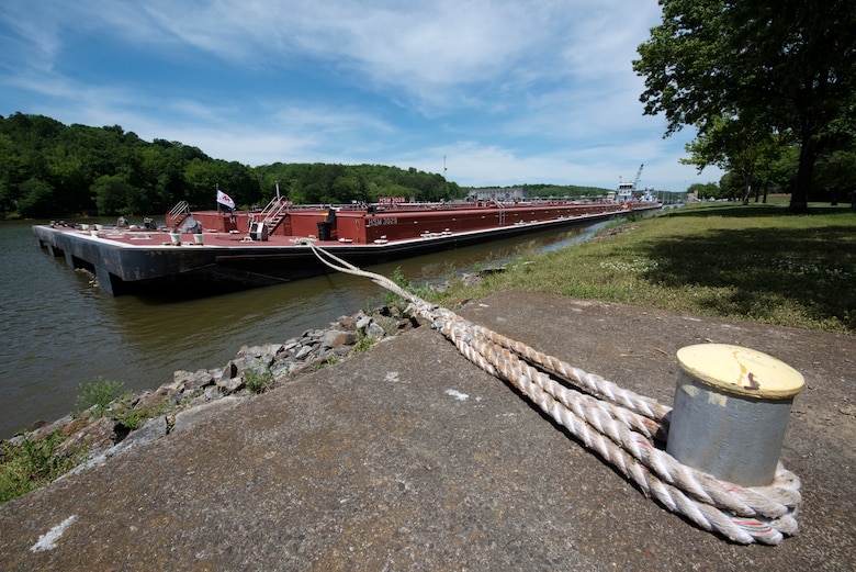 The Motor Vessel Tampa out of Ashland, Kentucky, is moored just upstream of Cheatham Lock with Marathon Petroleum Company fuel barges May 21, 2021. The barges were about to depart for terminals in Nashville. The U.S. Army Corps of Engineers Nashville District worked with the fuel industry and Regional Rivers Repair Fleet, which is performing maintenance at the lock, to schedule openings to accommodate deliveries of fuel to Middle Tennessee. Each barge carries around 28,000 barrels of fuel. (USACE Photo by Lee Roberts)