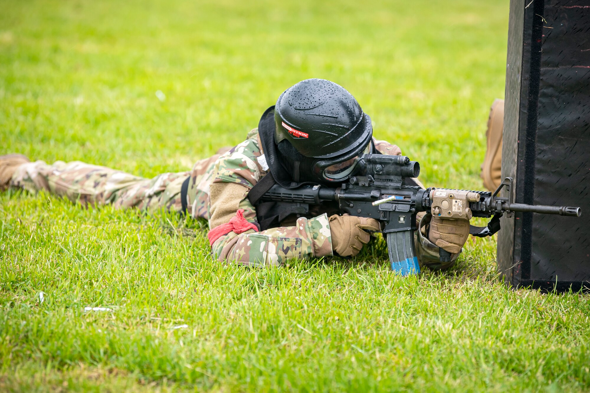 An Airman from the 422d Security Forces Squadron fires an M4 carbine during a Force-on-Force exercise at RAF Molesworth, England, May 21, 2021. Defenders from the 422d and 423rd SFS came together to sharpen their shoot, move, communicate tactics as they responded to multiple scenarios geared towards sharpening their skills in deadly force situations. (U.S. Air Force photo by Senior Airman Eugene Oliver)