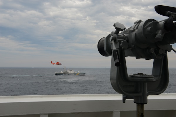 210508-G-ID129-1166 BLACK SEA (May 8, 2021) USCGC Hamilton (WMSL 753) and Ukrainian Sea Guard vessel Kuropiatnikov (BG-50) conduct underway maneuvers in the Black Sea while Hamilton’s MH-65 Dolphin helicopter detachment air crew conducts flight operations, May 8, 2021. Hamilton is on a routine deployment in the U.S. Sixth Fleet area of operations in support of U.S. national interests and security in Europe and Africa. (U.S. Coast Guard photo by Petty Officer 3rd Class Sydney Phoenix)
