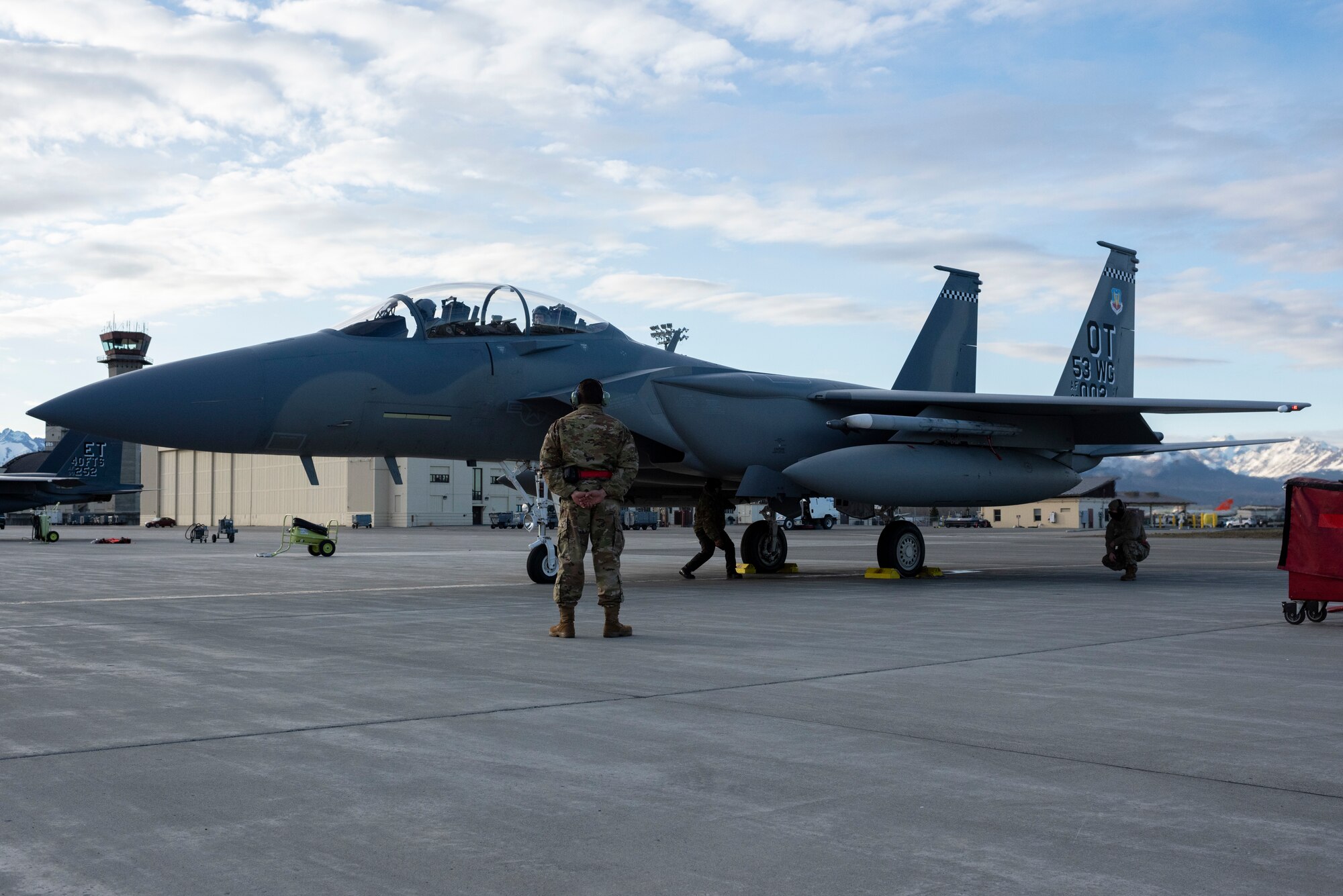 Airmen assigned to the 53rd Wing out of Eglin Air Force Base, Fla., prepare to launch an F-15EX Eagle in support of Northern Edge 21 at Joint Base Elmendorf-Richardson, Alaska, May 12, 2021. Approximately 15,000 U.S. service members participate in a joint training exercise hosted by U.S. Pacific Air Forces May 3-14, 2021, on and above the Joint Pacific Alaska Range Complex, the Gulf of Alaska, and temporary maritime activities area. NE21 is one in a series of U.S. Indo-Pacific Command exercises designed to sharpen the joint forces' skills, practice tactics, techniques, and procedures, improve command, control, and communication relationships develop cooperative plans and programs. (U.S. Air Force photo by Alejandro Peña)