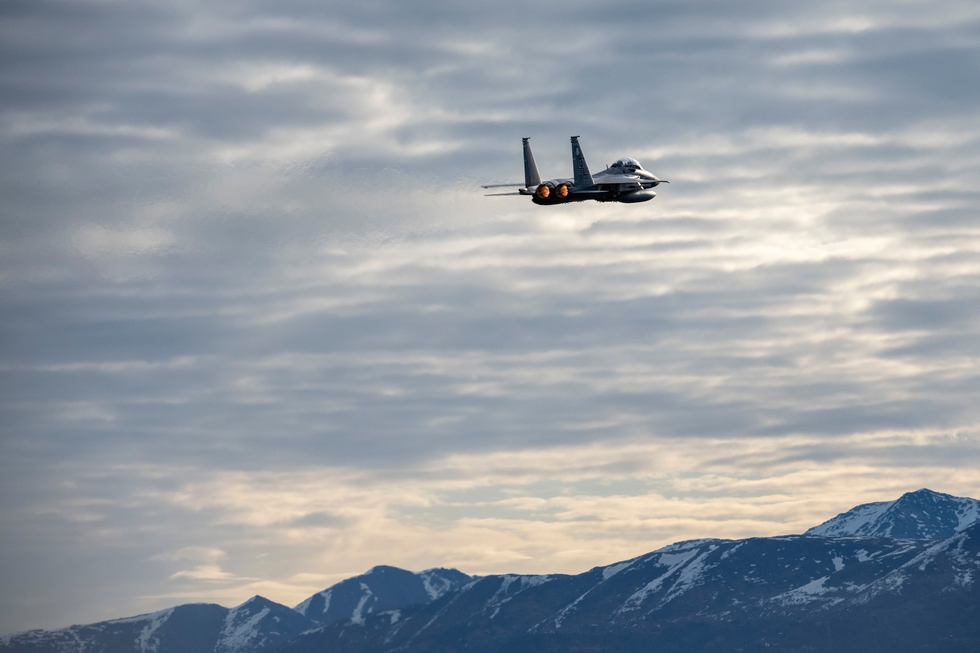 A U.S. Air Force F-15EX Eagle assigned to the 53rd Wing out of Eglin Air Force Base, Fla., takes off in support of Northern Edge 21 at Joint Base Elmendorf-Richardson, Alaska, May 12, 2021. Approximately 15,000 U.S. service members participate in a joint training exercise hosted by U.S. Pacific Air Forces May 3-14, 2021, on and above the Joint Pacific Alaska Range Complex, the Gulf of Alaska, and temporary maritime activities area. NE21 is one in a series of U.S. Indo-Pacific Command exercises designed to sharpen the joint forces' skills, practice tactics, techniques, and procedures, improve command, control, and communication relationships develop cooperative plans and programs. (U.S. Air Force photo by Alejandro Peña)