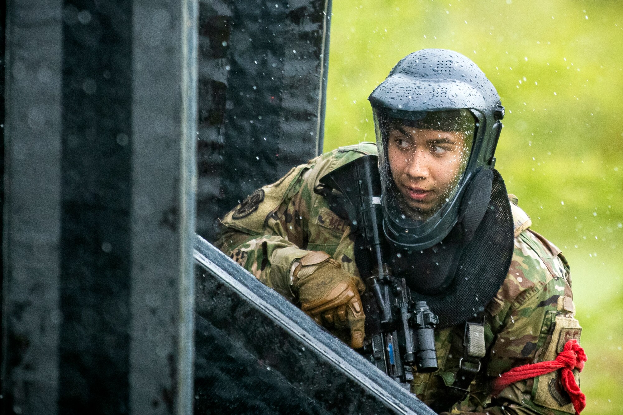 U.S. Air Force Airman 1st Class Luciano Medrano, 423rd Security Forces Squadron response force leader, scans his perimeter during a Force-on-Force exercise at RAF Molesworth, England, May 21, 2021. Defenders from the 422d and 423rd SFS came together to sharpen their shoot, move, communicate tactics as they responded to multiple scenarios geared towards sharpening their skills in deadly force situations. (U.S. Air Force photo by Senior Airman Eugene Oliver)