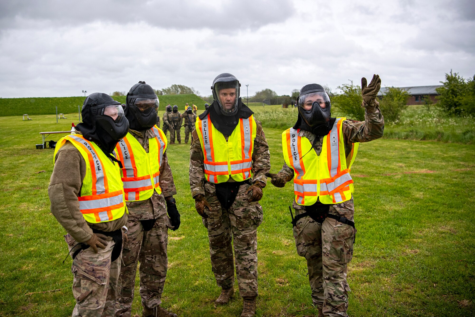 Tech Sgt. Brittany Lepchenske, right, 423rd Security Forces Squadron noncommissioned officer in charge of training, speaks with Airmen from the 423rd SFS prior to a Force-on-Force exercise at RAF Molesworth, England, May 21, 2021. Defenders from the 422d and 423rd SFS came together to sharpen their shoot, move, communicate tactics as they responded to multiple scenarios geared towards sharpening their skills in deadly force situations. (U.S. Air Force photo by Senior Airman Eugene Oliver)