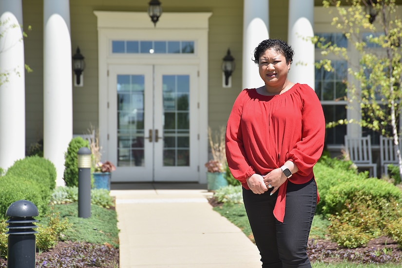 Sandy Williams, 316th Wing privatized housing resident advocate, poses for a photo on May 6, 2021, at Joint Base Andrews, Md. Williams is the base resident advocate whose job it is to assist service members and their families in finding solutions to their housing issues. (U.S. Air Force photo by Senior Airman Daniel Brosam)