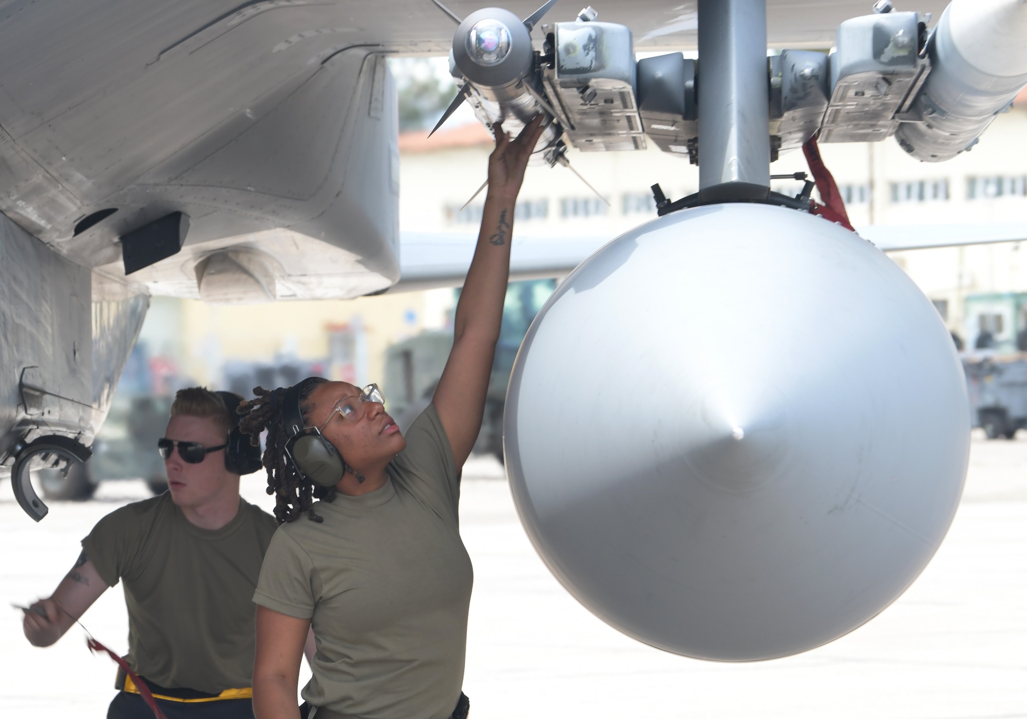 U.S. Air Force Staff Sgt. Jemara McCoy, 493rd Aircraft Maintenance Unit weapons load crew team chief, disarms munitions on an F-15C Eagle assigned to the 493rd Fighter Squadron during exercise Astral Knight 21 at Larissa Air Base, Greece, May 20, 2021. The 48th Fighter Wing trained and integrated with allied NATO nations during Astral Knight 21, May 17 - 21, 2021, strengthening partnerships and rapid deployment capabilities. (U.S. Air Force photo by Tech. Sgt. Alex Fox Echols III)