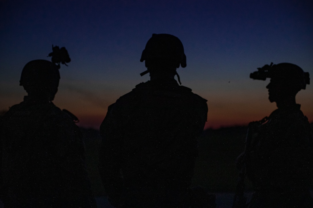 U.S. Marines with Echo Company, 2d Battalion, 8th Marine Regiment, 2d Marine Division, prepare for night attacks on a company battle course on range G-36, Camp Lejeune, N.C., May 23, 2021. Echo Company was the first company to execute the battle course as a night live-fire event. The event is the culmination of their Marine Corps Combat Readiness Evaluation, certifying the unit as an apex battalion. (U.S. Marine Corps photo by Lance Cpl. Jacqueline Parsons)