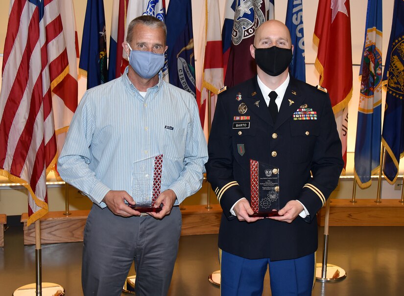 Jack Rosarius, left, and Chief Warrant Officer 3 Joshua Barto are pictured after receiving the first Dean R. Ohlsen Award of Excellence during Army Medical Logistics Command’s Healthcare Technology Management workshop May 19 at Fort Detrick, Maryland. Not pictured is the third award winner, 1st Sgt. Jose Maldonado, who was not able to attend the event in person. (C.J. Lovelace)