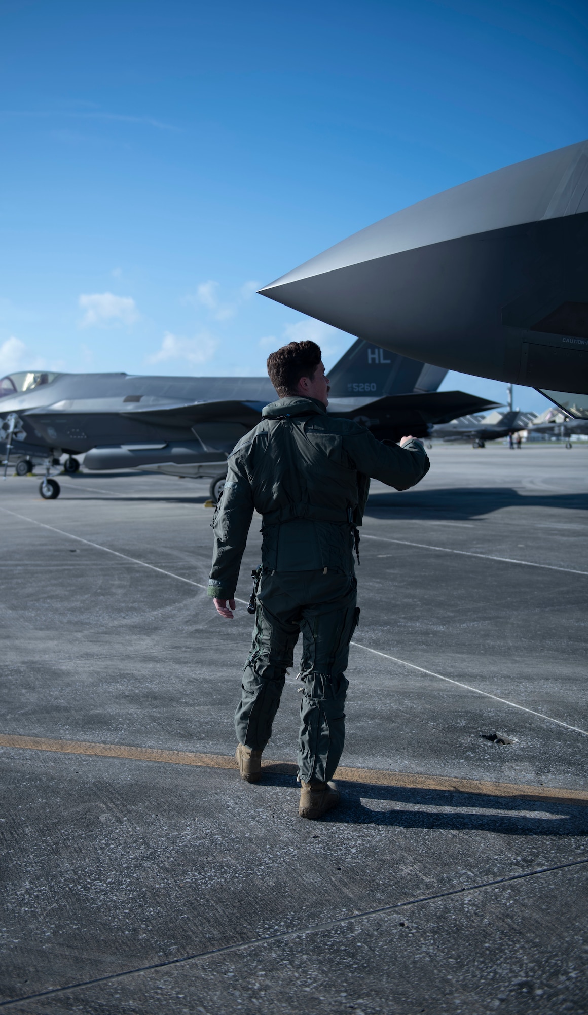 Man looking at a plane