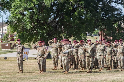 Soldiers of the 82nd Finance Battalion salute during their unit's re-activation ceremony at Fort Bragg, North Carolina, May 20, 2021. (U.S. Army photo by Master Sgt. Alex Burnett)