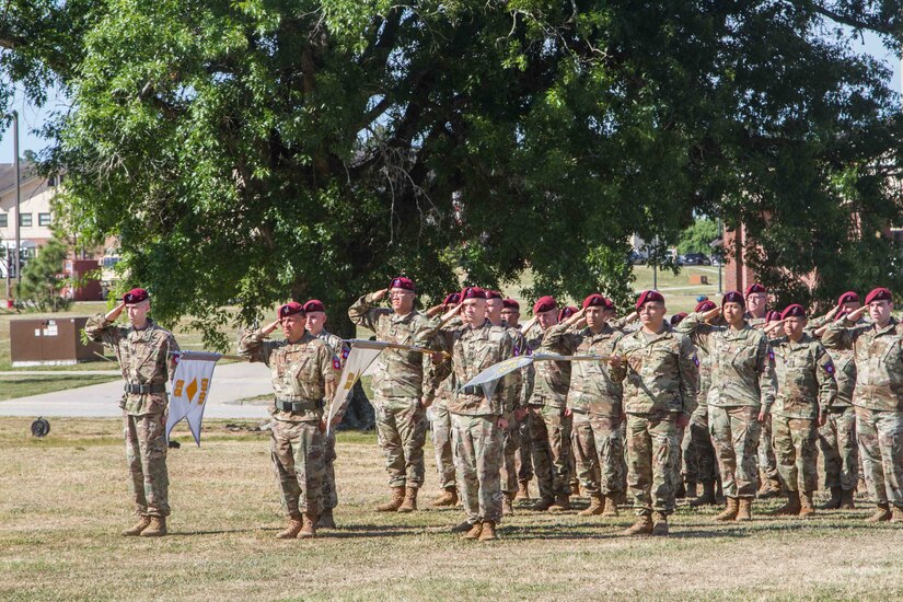 Soldiers of the 82nd Finance Battalion salute during their unit's re-activation ceremony at Fort Bragg, North Carolina, May 20, 2021. (U.S. Army photo by Master Sgt. Alex Burnett)