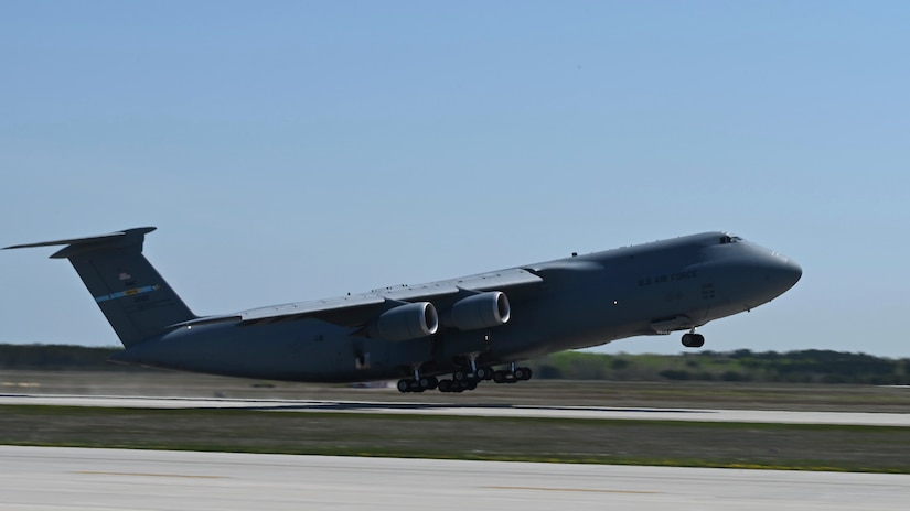A C-5 Galaxy assigned to the 436th Airlift Wing takes off from Alpena Combat Readiness Training Center, Michigan