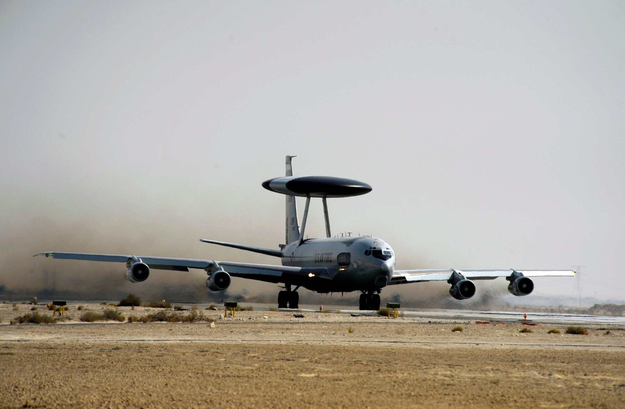 A U.S. Air Force E-3 Sentry aircraft from the 964th Expeditionary Airborne Air Control Squadron takes off from an undisclosed location in Southwest Asia on Nov. 23, 2010. The E-3 is an Airborne Warning and Control System (AWACS) that provides all-weather surveillance, command, control and communications. (U.S. Air Force photo by Staff Sgt. Eric Harris)