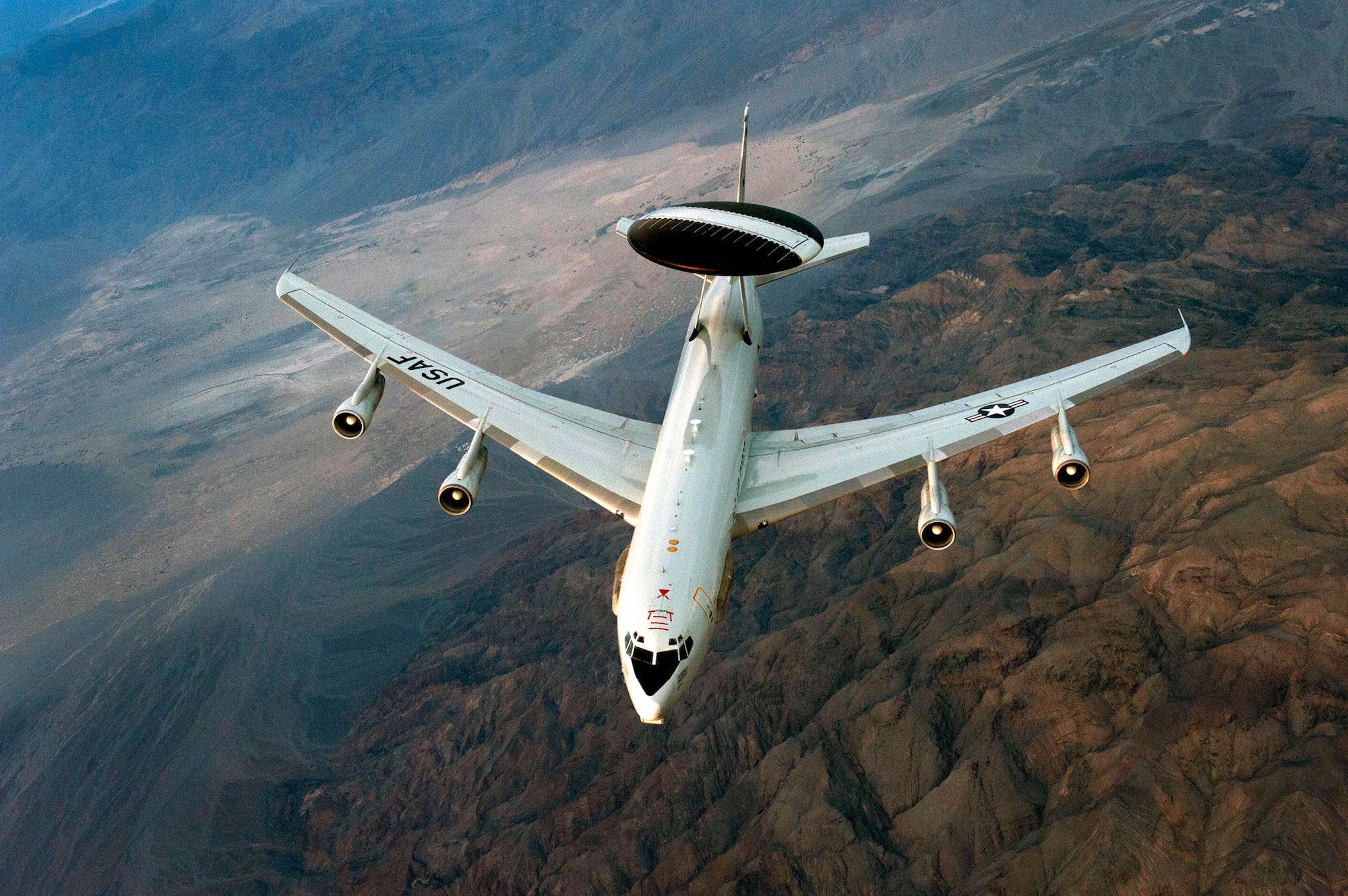An E-3 Sentry airborne warning and control system aircraft soars over Nevada after a refueling mission during exercise Green Flag-West 13-02 at Nellis Air Force Base, Nev., Nov. 1, 2012. The aircraft is assigned to the 963rd Airborne Air Control Squadron at Tinker Air Force Base, Okla. (U.S. Air Force photo/Val Gempis)