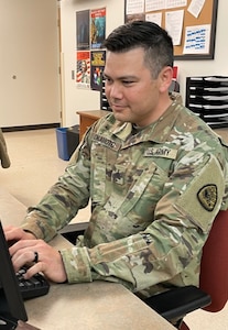 Soldier at a computer