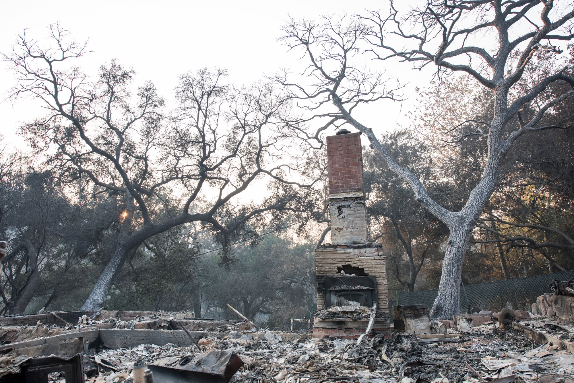 A chimney is all that stands of a home burned by the Thomas Fire. The fire started on Dec. 4, 2017 in Santa Paula, near Thomas Aquinas College. Driven by Santa Ana winds gusting up to 70 mph, the flames screamed across the hillsides toward Ojai, Ventura and Santa Barbara. The 146 Airlift Wing was activated Dec.5, 2017, to support CAL FIRE with wildfire suppression efforts within the state. (U.S. Air Force photo/Master Sgt. Brian Ferguson)
