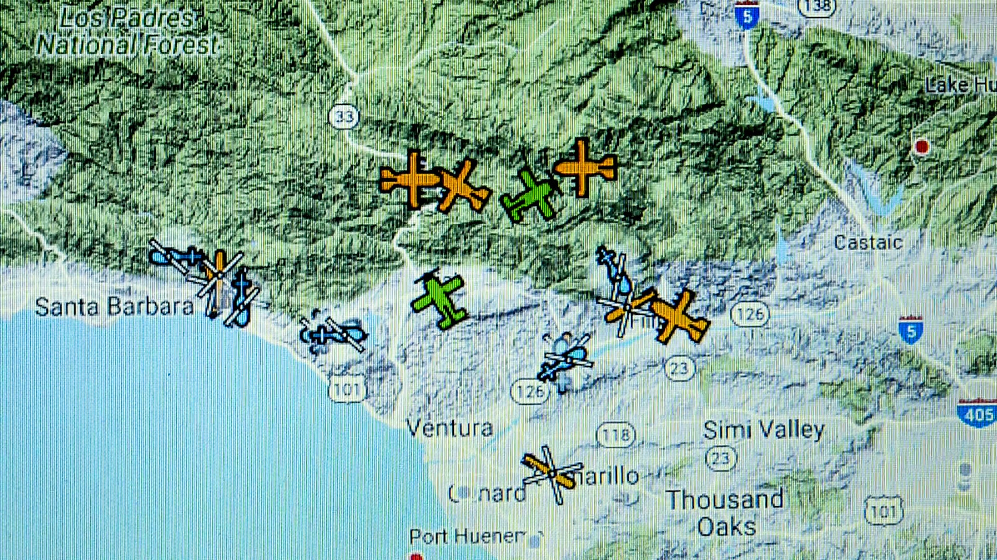 A computer display at the 146th Airlift Wing at Channel Islands Air National Guard Base in Port Hueneme, California, shows the position of aircraft performing aerial firefighting operations to combat the Thomas Fire in Ventura and Santa Barbara Counties, Dec. 10, 2017. (U.S. Air Force photo by J.M. Eddins Jr.)