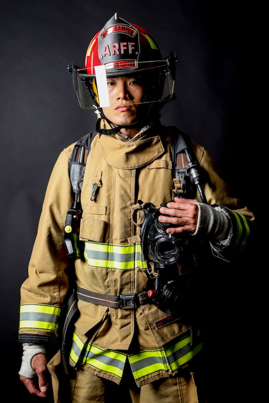 U.S. Marine Sgt. Qihang Lin, a station captain with Aircraft Rescue and Firefighting, Headquarters and Headquarters Squadron, Marine Corps Air Station Camp Pendleton, poses for a photo on Marine Corps Base Camp Pendleton, California, March 31, 2021. Lin was recognized as the 2020 Marine Corps Firefighter of the Year for his dedication to improving himself and the Marines around him. (U.S. Marine Corps photo by Lance Cpl. Kerstin Roberts)