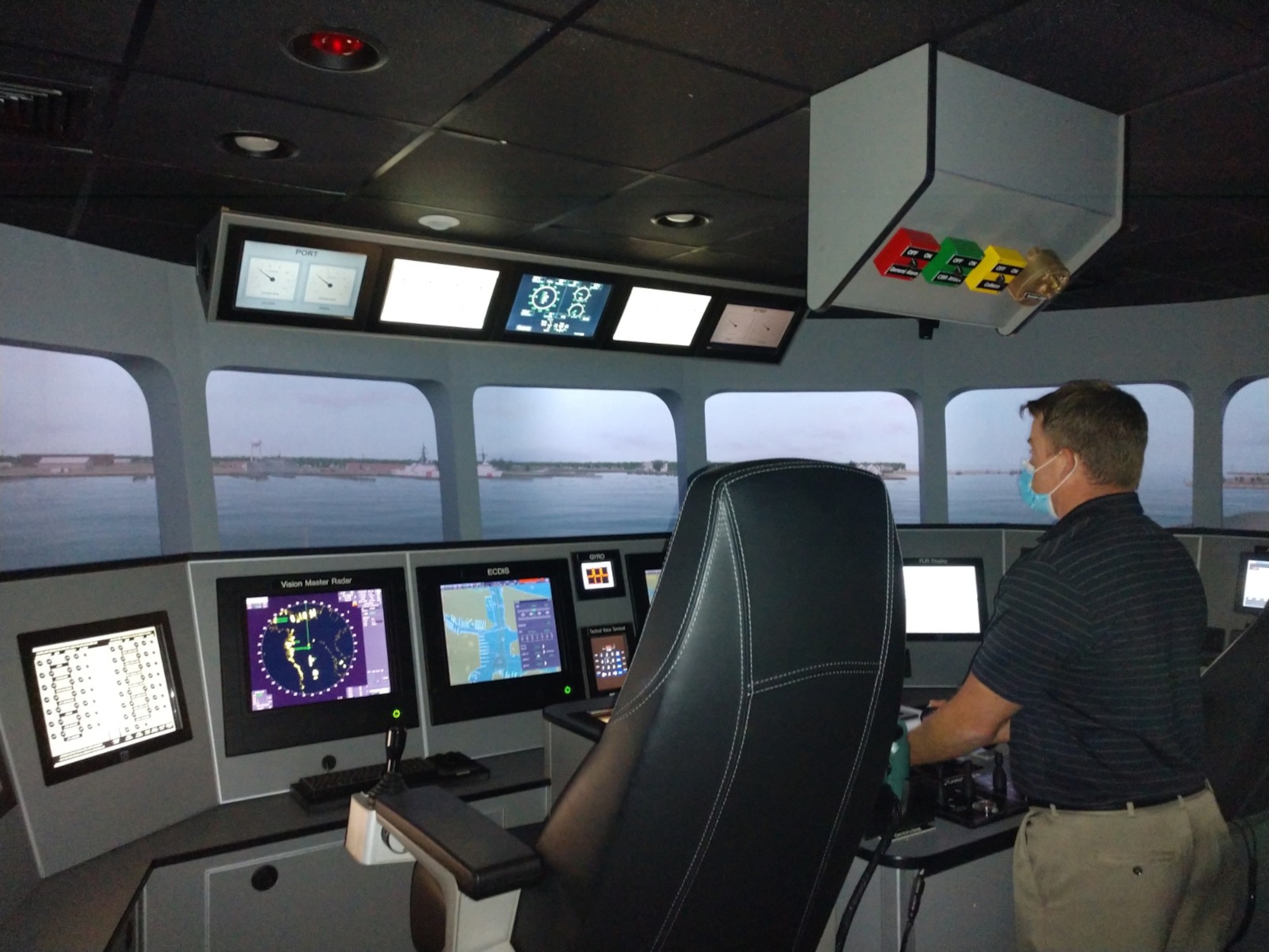 Eric Lehman, U.S. Army Transportation School Maritime & Intermodal Training Department instructor, operates the Expeditionary Fast Transport Simulator at Fort Eustis. The simulator is used to train mariners from the Military Sealift Command. EPF ships are high-speed, shallow draft ships capable of intra-theater personnel and cargo lift for the armed services. (Courtesy photo)