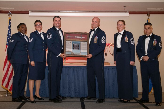 person receives award
