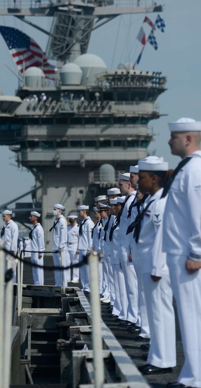 SAN DIEGO (April 24, 2016) Members of the color guard from the aircraft  carrier USS Theodore Roosevelt (CVN 71) parade the colors on the field at  Petco Park, home field of the