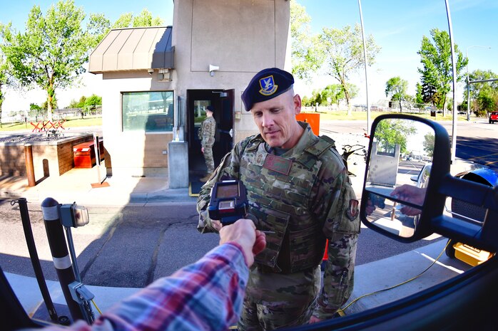 Hill’s retiring 75th Air Base Wing Command Chief, Chief Master Sgt. Christopher Walker, goes back to his roots as a security Forces defender May 25 and works a shift at Hill’s South Gate. Walker became the wing’s command chief in 2018, where he looks for the best in people and passes along a positive influence. Walker’s nearly 30-year career culminates with a retirement ceremony at Hill May 28. (U.S. Air Force photo by Todd Cromar)
