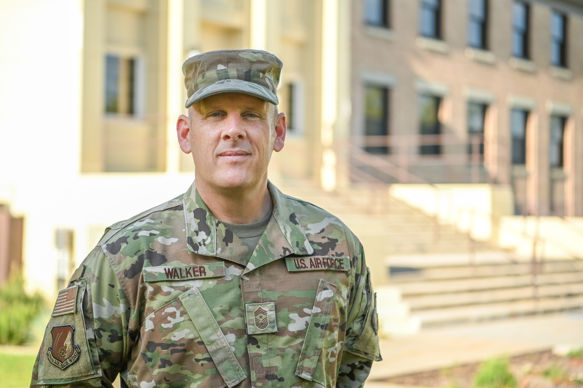 Chief Master Sgt. Christopher Walker, 75th Air Base Wing command chief, poses in front of the 75th ABW command building May 18, 2021, at Hill Air Force Base, Utah. Walker retires from the Air Force May 27 after 29 years of service. (U.S. Air Force photo by Cynthia Griggs)