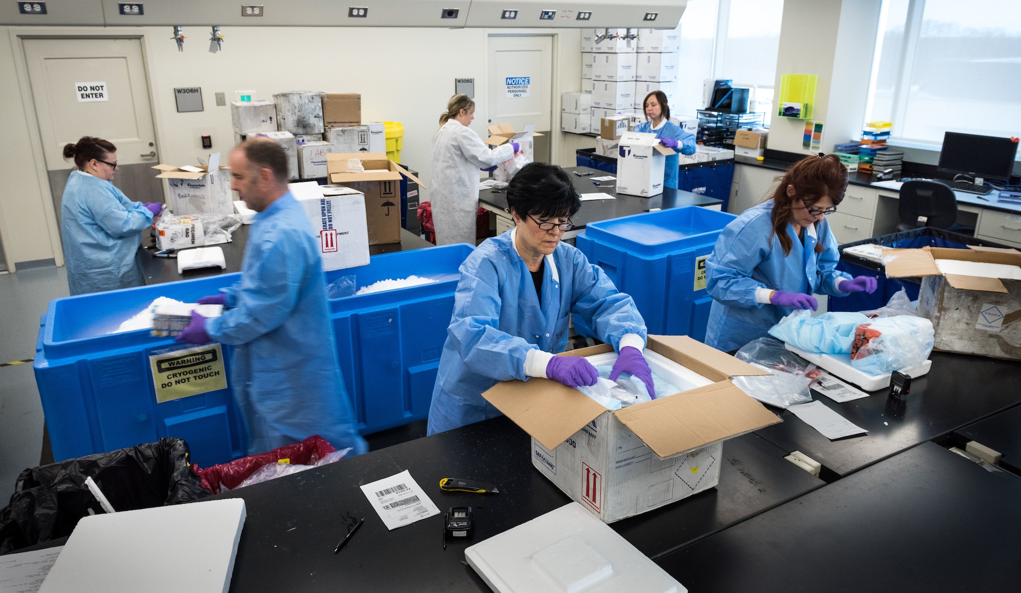 Laboratory technicians unpack and log in blood serum, fecal, urine or respiratory samples which arrive from U.S. Air Force hospitals and clinics around the world, as well as some other Department of Defense facilities Jan. 30, 2018. The Epidemiology Laboratory Service, also known as the �Epi Lab,� at the 711th Human Performance Wing�s United States Air Force School of Aerospace Medicine and Public Health at Wright Patterson AFB, Ohio, receives 100-150 boxes a day, six days a week. The lab, which tests between 5,000 and 8,000 samples daily, is a Department of Defense reference laboratory offering clinical diagnostic, public health, and force health screening and testing. (U.S. Air Force photo by J.M. Eddins Jr.)