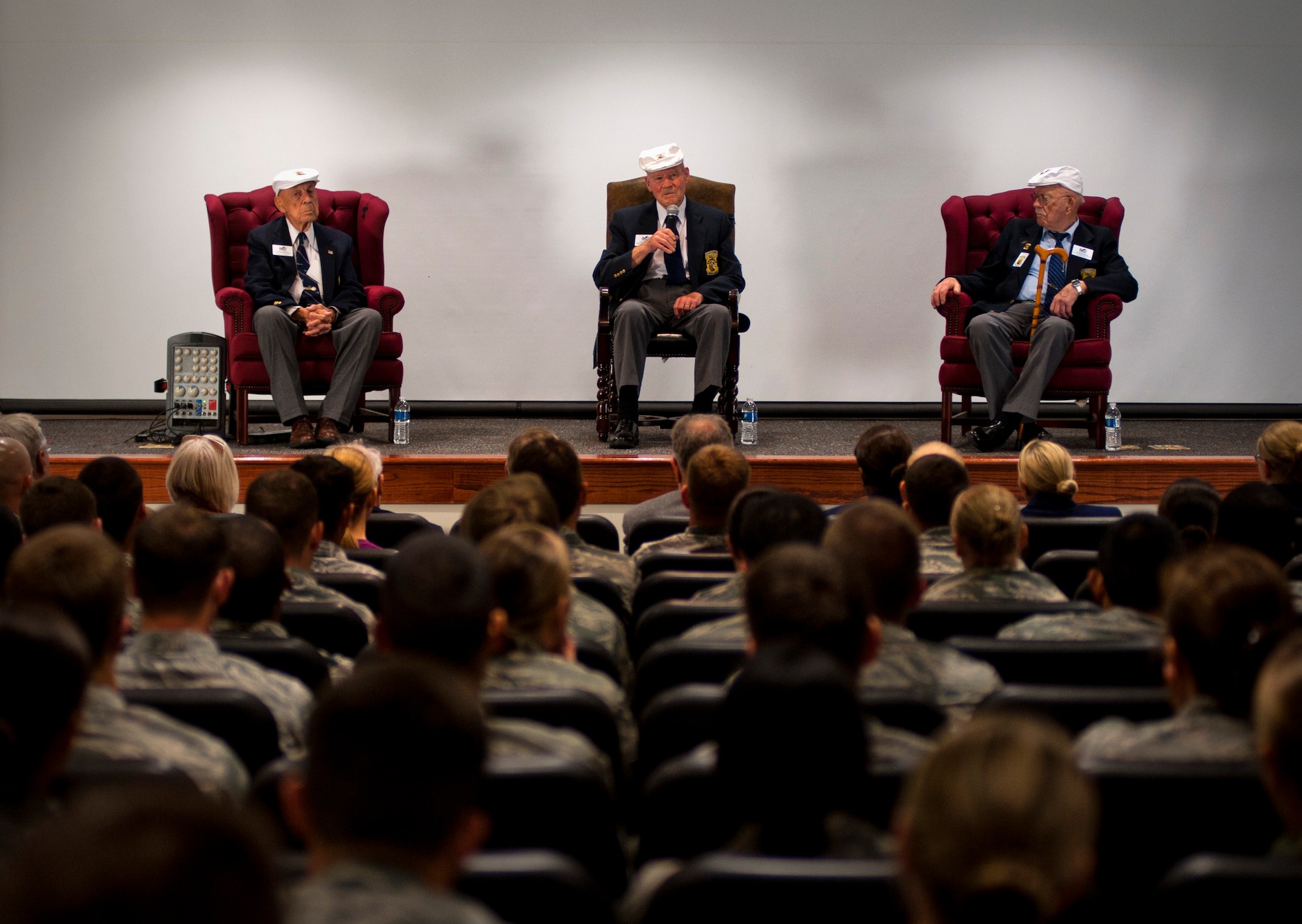 From left, retired Staff Sgt. David Thatcher, Retired Lt. Col. Dick Cole and retired Lt. Col. Ed Saylor, answer questions from Airmen at Hurlburt Field, Fla., April 18, 2013. The three men are part of the Doolittle Raiders, who bombed Tokyo 71 years ago today. (U.S. Air Force photo by Staff Sgt. David Salanitri)