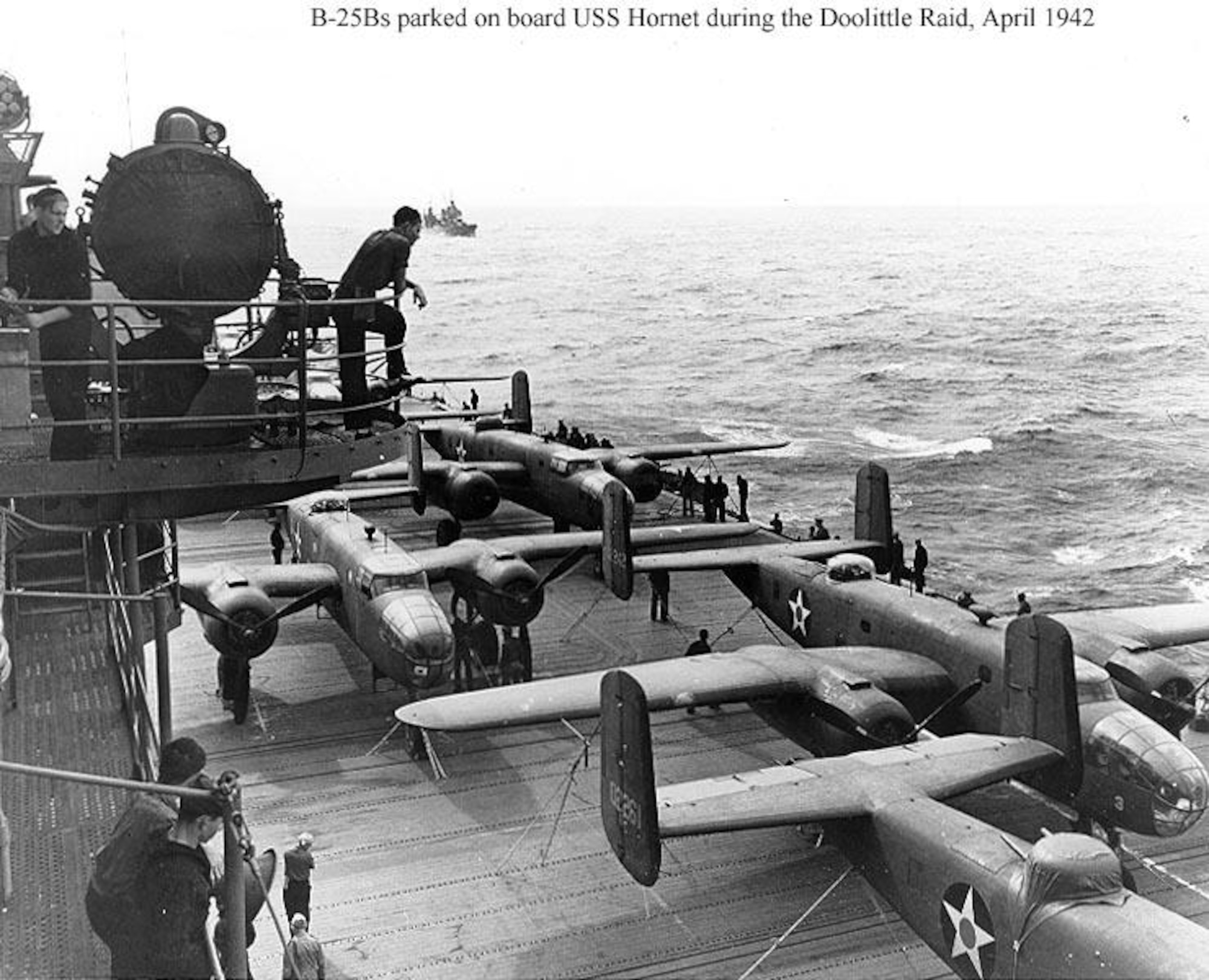 United States Army Air Forces B-25 bombers are tied down to the deck of the USS Hornet before the "Doolittle Raid" on Tokyo, Saturday, April 18, 1942.